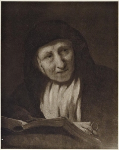 An Old Woman with a Book and Spectacles by Nicolaes Maes