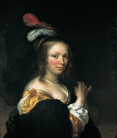 Portrait of a woman wearing a hat with feathers by Govert Flinck