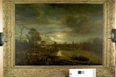 Riviergezicht met trekschuit bij maanlicht by Aert van der Neer