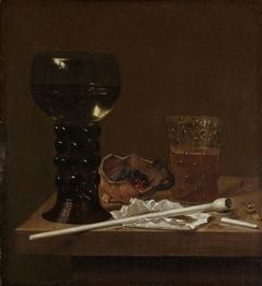 Still life with wineglass, beer glass and pipe by Jan Jansz van de Velde