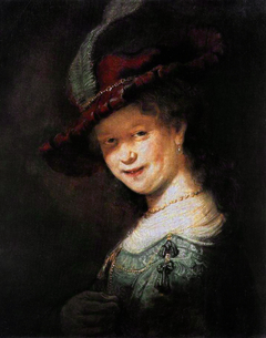 Bust of a Young Woman Smiling, possibly Saskia van Uylenburgh by Rembrandt