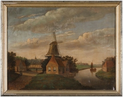 Gezicht op een molen met daarvoor een huis by anonymous painter