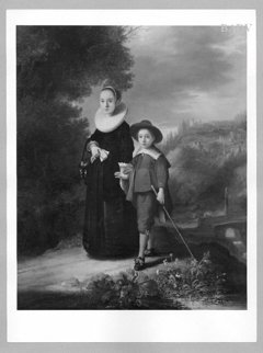 portrait of a lady and a boy by Govert Flinck