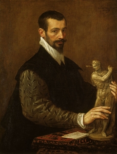 Portrait of Tiziano Aspetti holding a statuette by Leandro Bassano