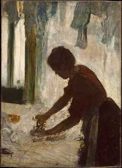 A Woman Ironing by Edgar Degas