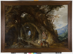 Berglandschap met reizigers bij een kapel by Joos de Momper