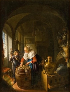 Kitchen scene with a woman and a boy with a mousetrap by Gerrit Dou