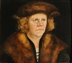 Portrait of a man in a fur beret by Lucas Cranach the Elder