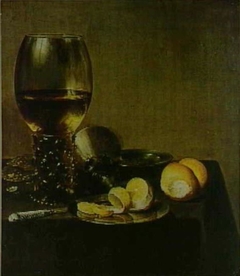 Still life with roemer, lemon and oysters by Pieter Claesz