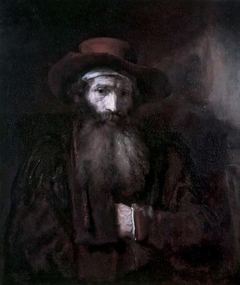 Half-length portrait of a man with beard and headscarf under his hat by Rembrandt