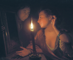 Young woman admiring an ear-pendant by candlelight by Godfried Schalcken