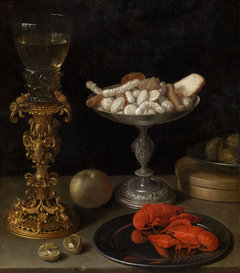 A roemer on a silver-gilt bekerschroef, sweetmeats in a silver tazza, langoustines on a plate, walnuts and an apple on a table top by Jeremias van Winghe