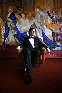 Oscar Casares in front of his painting - panel Salve Regina by Oscar Casares