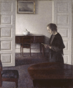 Interior with a Reading Lady by Vilhelm Hammershøi