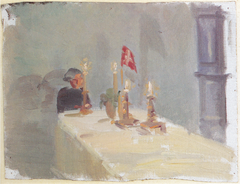 Birthday. A woman at the end of a table with candles and a flag by Anna Ancher