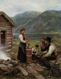 Family in a Norwegian fjord landscape by Jahn Ekenæs