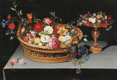 Mixed flowers in a basket with a tazza nearby by Jan Brueghel the Younger