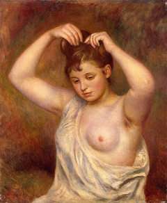 Woman Arranging her Hair by Auguste Renoir