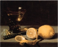 Still life with berkemeyer, lemon, grapes and knife by Pieter Claesz