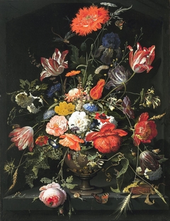 Flowers in a metal vase in a niche by Abraham Mignon