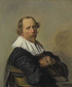 Portrait of a man leaning over the back of a chair by Frans Hals