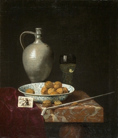 Still Life with a Pipe, Nuts, a Pitcher and a Tobacco Pouch by Hubert van Ravesteyn